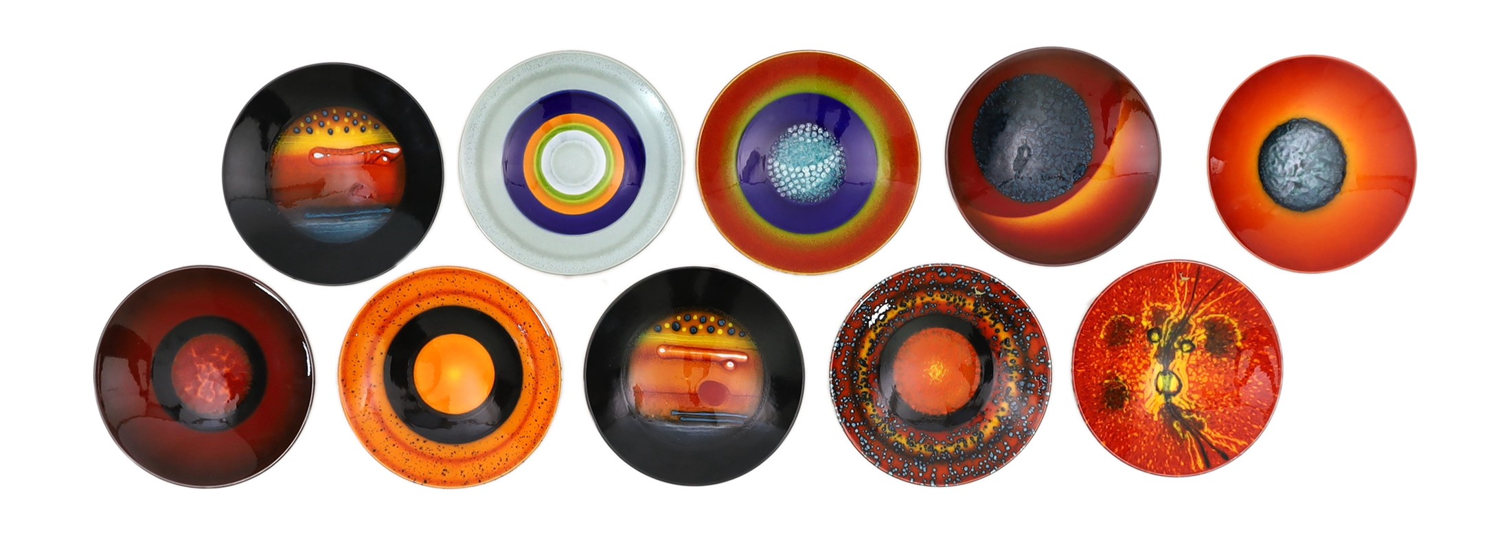 Alan Clarke for Poole Pottery. A set of nine ‘Alignment of the Planets’ chargers and one duplicate, c.2000, 26cm diameter